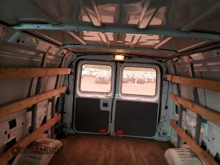 2013 Ford Econoline Cargo Commercial z VIN 1FTNE2EW6DDA80208, wystawiony jako Copart lot #57355035 z przebiegiem 260 858 mil mil oraz Czysty tytuł • Clean title. Historia ofert i sprzedaży dostępna na DreamBid. Obrazek 10.