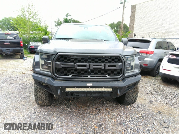 2017 Ford F-150 Raptor with VIN 1FTFW1RG8HFA31164, listed as a IAAI auction lot 42125542 with 164,745 mi miles and . Bid and sale history available at carsss.com. Image 12.