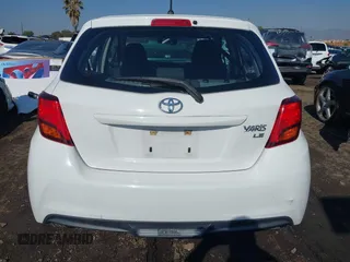 2015 Toyota Yaris L with VIN VNKKTUD30FA051732, listed as a IAAI auction lot 41449083 with 82,207 mi miles. Bid and sale history available at carsss.com. Image 17.