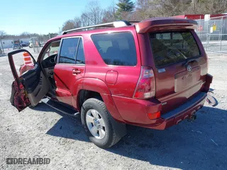 2005 Toyota 4Runner SR5 with VIN JTEBU14R658051910, listed as a IAAI auction lot 41691568 with 153,066 mi miles. Bid and sale history available at carsss.com. Image 3.