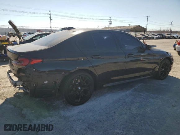 2021 BMW 5 Series 530e with VIN WBA13AG04MCF47235, listed as a Copart auction lot 69120474 with 74,779 mi miles and Salvage Title. Bid and sale history available at carsss.com. Image 3.