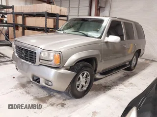 1999 Cadillac Escalade z VIN 1GYEK13RXXR413480, wystawiony jako IAAI lot #41552688 z przebiegiem 214 501 mil mil oraz . Historia ofert i sprzedaży dostępna na DreamBid. Obrazek 2.