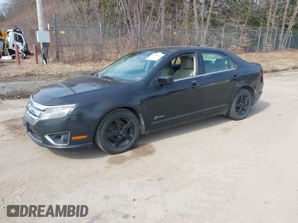 2010 Ford Fusion Hybrid with VIN 3FADP0L35AR168002, listed as a IAAI auction lot 42090134 with 147,831 mi miles. Bid and sale history available at carsss.com. Image 2.