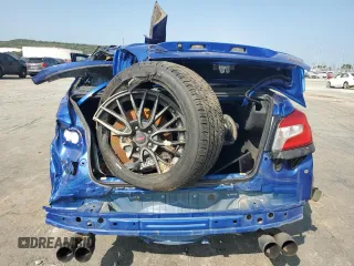 2015 Subaru WRX STI with VIN JF1VA2L66F9804795, listed as a Copart auction lot 71095344 with 141,122 mi miles and Salvage title. Bid and sale history available at DreamBid. Image 6.