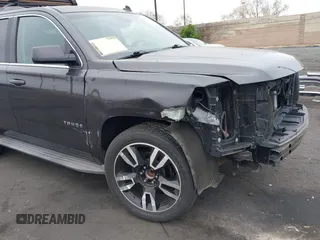 2015 Chevrolet Tahoe LT with VIN 1GNSCBKC1FR233898, listed as a IAAI auction lot 42004048 with 115,779 mi miles and . Bid and sale history available at DreamBid. Image 6.