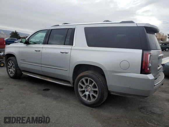 2016 GMC Yukon XL Denali with VIN 1GKS2HKJ8GR239748, listed as a Copart auction lot 71852054 with 112,471 mi miles and Salvage Title. Bid and sale history available at carsss.com. Image 2.