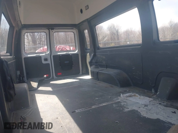2014 Ford Econoline Cargo Commercial with VIN 1FTNS2EW7EDA67834, listed as a IAAI auction lot 42026939 with 138,501 mi miles. Bid and sale history available at carsss.com. Image 8.