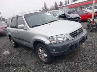 1999 Honda CR-V EX with VIN JHLRD1866XC033865, listed as a IAAI auction lot 41219896 with 142,396 mi miles. Bid and sale history available at carsss.com. Image 1.