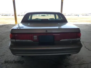 1995 Mercury Cougar z VIN 1MELM62W2SH613956, wystawiony jako Copart lot #49742425 z przebiegiem 94 806 mil mil oraz Tytuł czysty. Historia ofert i sprzedaży dostępna na DreamBid. Obrazek 6.