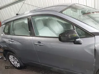 2022 Toyota Corolla Cross L with VIN 7MUAAAAG9NV034659, listed as a IAAI auction lot 42125356 with 14,631 mi miles and . Bid and sale history available at DreamBid. Image 13.