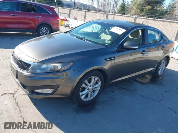 2013 Kia Optima LX with VIN 5XXGM4A74DG114626, listed as a IAAI auction lot 41349903 with 126,856 mi miles. Bid and sale history available at carsss.com. Image 2.
