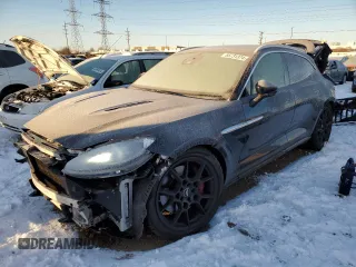 2021 Aston Martin DBX z VIN SCFVUJAW9MTV02708, wystawiony jako Copart lot #85731374 z przebiegiem Nie podano mil oraz Szkody całkowita. Historia ofert i sprzedaży dostępna na DreamBid. Obrazek 1.
