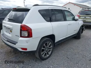2014 Jeep Compass Limited with VIN 1C4NJDCB6ED684897, listed as a IAAI auction lot 41920568 with 175,196 mi miles. Bid and sale history available at carsss.com. Image 4.