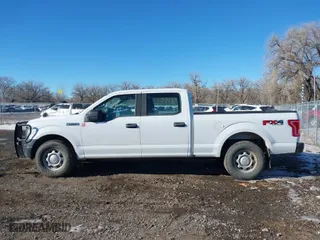 2015 Ford F-150 XLT w/HD Payload Pkg with VIN 1FTFW1EF8FFC07270, listed as a IAAI auction lot 41425948 with 194,107 mi miles. Bid and sale history available at carsss.com. Image 14.