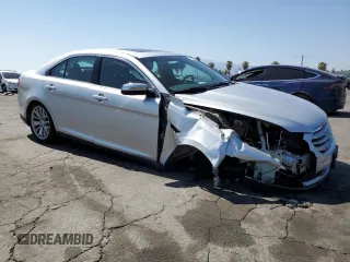 2015 Ford Taurus Limited с VIN 1FAHP2F84FG106058, выставлен на аукционе Copart как лот 57621355 с пробегом 130 582 миль миль и Списание • Salvage title. История ставок и продаж доступна на DreamBid. Изображение 4.