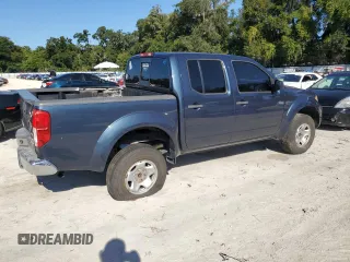2015 Nissan Frontier Pro-4X with VIN 1N6AD0EV7FN739064, listed as a Copart auction lot 71785524 with 137,133 mi miles and Salvage title. Bid and sale history available at DreamBid. Image 3.