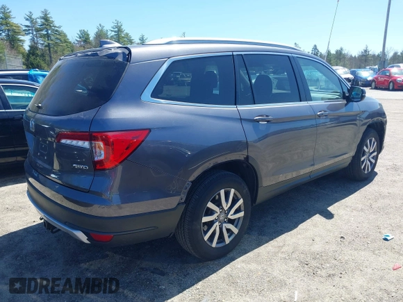 2021 Honda Pilot EX-L with VIN 5FNYF6H59MB016354, listed as a IAAI auction lot 42108020 with 61,436 mi miles and . Bid and sale history available at DreamBid. Image 4.