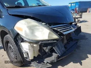 2008 Nissan Versa 1.8 S with VIN 3N1BC13E28L454216, listed as a IAAI auction lot 41992366 with 195,288 mi miles. Bid and sale history available at carsss.com. Image 16.