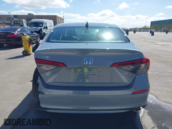 2022 Honda Civic Sport with VIN 2HGFE2F57NH600299, listed as a IAAI auction lot 41709059 with 9,060 mi miles and . Bid and sale history available at carsss.com. Image 17.
