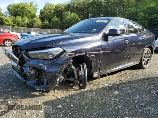 2023 BMW X6 xDrive40i z VIN 5UXCY6C05P9P71983, wystawiony jako Copart lot #42085065 z przebiegiem 18 177 mil mil oraz Nie do naprawy. Historia ofert i sprzedaży dostępna na DreamBid. Obrazek 1.