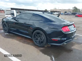 2021 Ford Mustang EcoBoost with VIN 1FA6P8TH2M5155461, listed as a IAAI auction lot 41933697 with 65,034 mi miles. Bid and sale history available at carsss.com. Image 3.