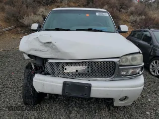 2001 GMC Yukon Denali z VIN 1GKEK63U01J287101, wystawiony jako Copart lot #43659115 z przebiegiem Nie podano mil oraz Szkoda całkowita • Salvage title. Historia ofert i sprzedaży dostępna na DreamBid. Obrazek 5.