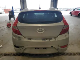 2012 Hyundai Accent SE z VIN KMHCU5AE7CU004256, wystawiony jako Copart lot #54447155 z przebiegiem 179 954 mil mil oraz Czysty tytuł • Clean title. Historia ofert i sprzedaży dostępna na DreamBid. Obrazek 6.