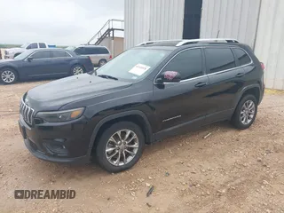 2019 Jeep Cherokee Altitude with VIN 1C4PJLLBXKD280354, listed as a IAAI auction lot 42124578 with 162,289 mi miles and . Bid and sale history available at DreamBid. Image 2.