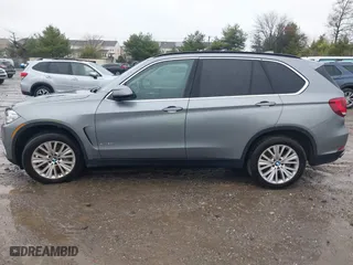 2015 BMW X5 xDrive50i with VIN 5UXKR6C57F0J74373, listed as a IAAI auction lot 42005050 with 108,382 mi miles. Bid and sale history available at carsss.com. Image 14.
