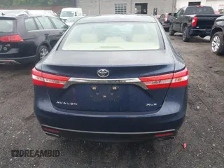 2014 Toyota Avalon Limited z VIN 4T1BK1EB5EU098361, wystawiony jako IAAI lot #42317290 z przebiegiem 243 175 mil mil oraz . Historia ofert i sprzedaży dostępna na DreamBid. Obrazek 16.