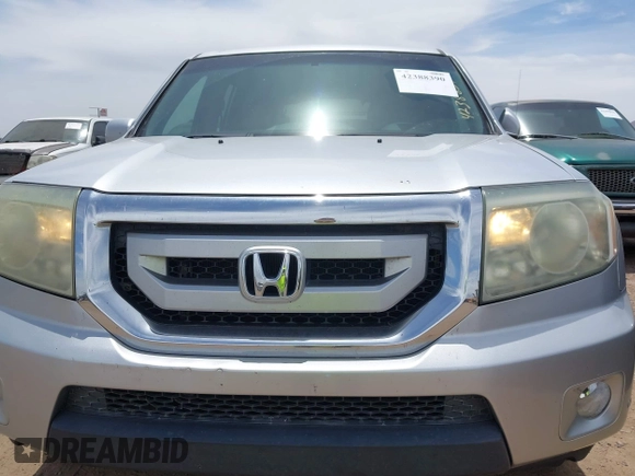 2011 Honda Pilot Touring z VIN 5FNYF3H90BB006634, wystawiony jako IAAI lot #42388390 z przebiegiem 218 475 mil mil oraz . Historia ofert i sprzedaży dostępna na DreamBid. Obrazek 6.