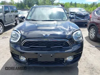 2017 MINI Countryman Cooper S z VIN WMZYT5C39H3D79798, wystawiony jako IAAI lot #42274782 z przebiegiem 96 669 mil mil oraz . Historia ofert i sprzedaży dostępna na DreamBid. Obrazek 13.