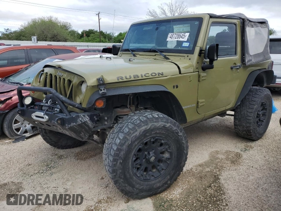 2013 Jeep Wrangler Rubicon z VIN 1C4HJWCG1DL574039, wystawiony jako Copart lot #48728645 z przebiegiem 116 537 mil mil oraz Szkoda całkowita • Salvage title. Historia ofert i sprzedaży dostępna na DreamBid. Obrazek 1.