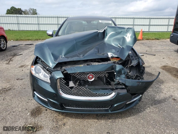 2014 Jaguar XJ with VIN SAJWJ2GD4E8V70170, listed as a Copart auction lot 69662054 with 121,188 mi miles and Non Repairable. Bid and sale history available at carsss.com. Image 5.