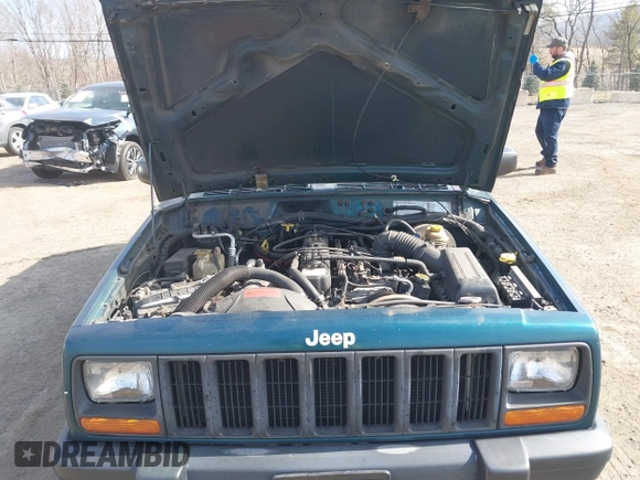 1998 Jeep Cherokee Sport z VIN 1J4FJ68S2WL136129, wystawiony jako IAAI lot #41810918 z przebiegiem 269 989 mil mil oraz . Historia ofert i sprzedaży dostępna na DreamBid. Obrazek 10.