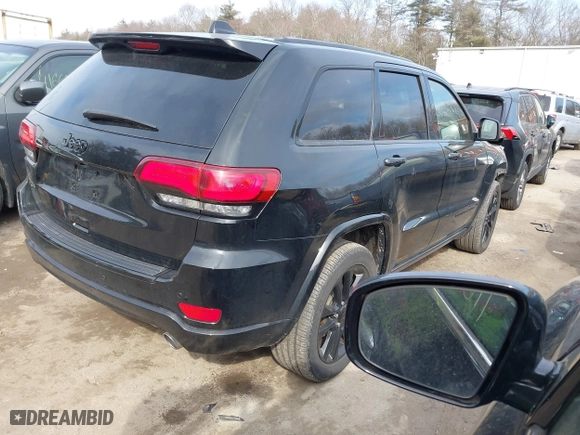 2018 Jeep Grand Cherokee Laredo E with VIN 1C4RJFAG2JC280670, listed as a IAAI auction lot 41686231 with 84,511 mi miles. Bid and sale history available at carsss.com. Image 4.