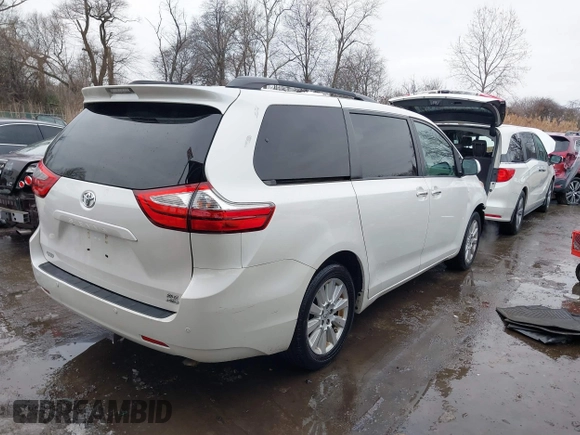2015 Toyota Sienna Ltd with VIN 5TDDK3DC9FS115784, listed as a IAAI auction lot 41355934 with 125,675 mi miles. Bid and sale history available at carsss.com. Image 4.