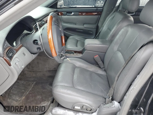 2002 Cadillac Seville Touring STS z VIN 1G6KY549X2U177791, wystawiony jako Copart lot #89313345 z przebiegiem 171 707 mil mil oraz Szkoda całkowita • Salvage title. Historia ofert i sprzedaży dostępna na DreamBid. Obrazek 7.