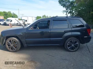 2005 Jeep Grand Cherokee Laredo z VIN 1J4GR48K65C725099, wystawiony jako IAAI lot #42509223 z przebiegiem 249 216 mil mil oraz . Historia ofert i sprzedaży dostępna na DreamBid. Obrazek 15.