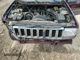 1994 Jeep Grand Cherokee Laredo z VIN 1J4GZ58S0RC221854, wystawiony jako Copart lot #61950825 z przebiegiem 69 465 mil mil oraz Czysty tytuł • Clean title. Historia ofert i sprzedaży dostępna na DreamBid. Obrazek 12.
