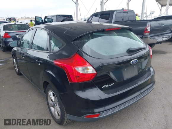 2014 Ford Focus SE with VIN 1FADP3K28EL375367, listed as a IAAI auction lot 42116798 with 129,380 mi miles. Bid and sale history available at carsss.com. Image 3.