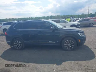 2018 Volkswagen Tiguan SEL z VIN 3VV2B7AX0JM047200, wystawiony jako IAAI lot #42221523 z przebiegiem 108 753 mil mil oraz . Historia ofert i sprzedaży dostępna na DreamBid. Obrazek 13.