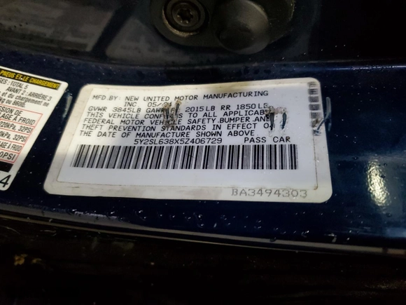 2005 Pontiac Vibe with VIN 5Y2SL638X5Z406729, listed as a Copart auction lot 52000195 with 285,537 mi miles and Salvage Title. Bid and sale history available at carsss.com. Image 14.