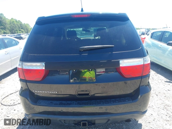 2013 Dodge Durango SXT with VIN 1C4RDJAG8DC617759, listed as a IAAI auction lot 42113300 with 185,152 mi miles and . Bid and sale history available at DreamBid. Image 16.
