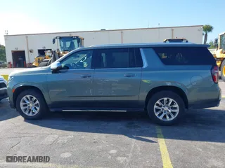 2023 Chevrolet Suburban Premier with VIN 1GNSCFKD4PR378869, listed as a IAAI auction lot 41802386 with 58,569 mi miles. Bid and sale history available at carsss.com. Image 14.