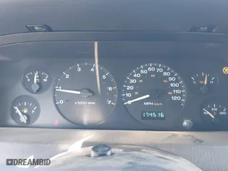 2002 Jeep Grand Cherokee Laredo with VIN 1J4GW48N72C261741, listed as a IAAI auction lot 40972222 with 174,516 mi miles. Bid and sale history available at carsss.com. Image 7.