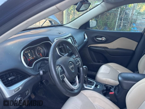 2016 Jeep Cherokee Altitude with VIN 1C4PJLAS7GW208431, listed as a Copart auction lot 61501525 with 126,107 mi miles and Salvage title. Bid and sale history available at DreamBid. Image 9.