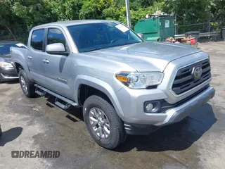 2019 Toyota Tacoma SR5 with VIN 3TMAZ5CN5KM081947, listed as a IAAI auction lot 42299992 with 87,593 mi miles and . Bid and sale history available at DreamBid. Image 1.