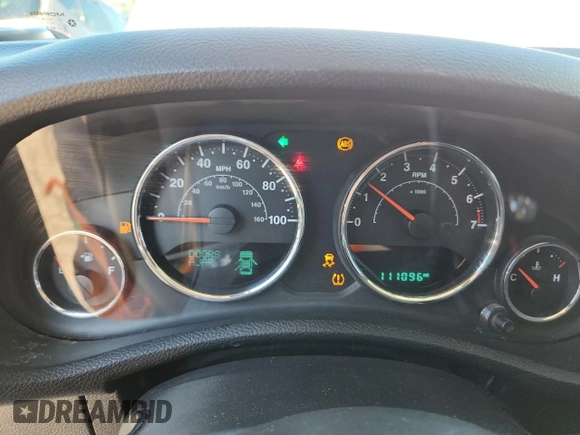 2015 Jeep Wrangler Unlimited Freedom with VIN 1C4HJWDGXFL755528, listed as a Copart auction lot 64927525 with 111,096 mi miles and Salvage title. Bid and sale history available at DreamBid. Image 9.