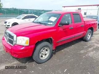 2007 Dodge Dakota SLT with VIN 1D7HW48N17S128373, listed as a IAAI auction lot 42633897 with 129,780 mi miles and . Bid and sale history available at DreamBid. Image 2.